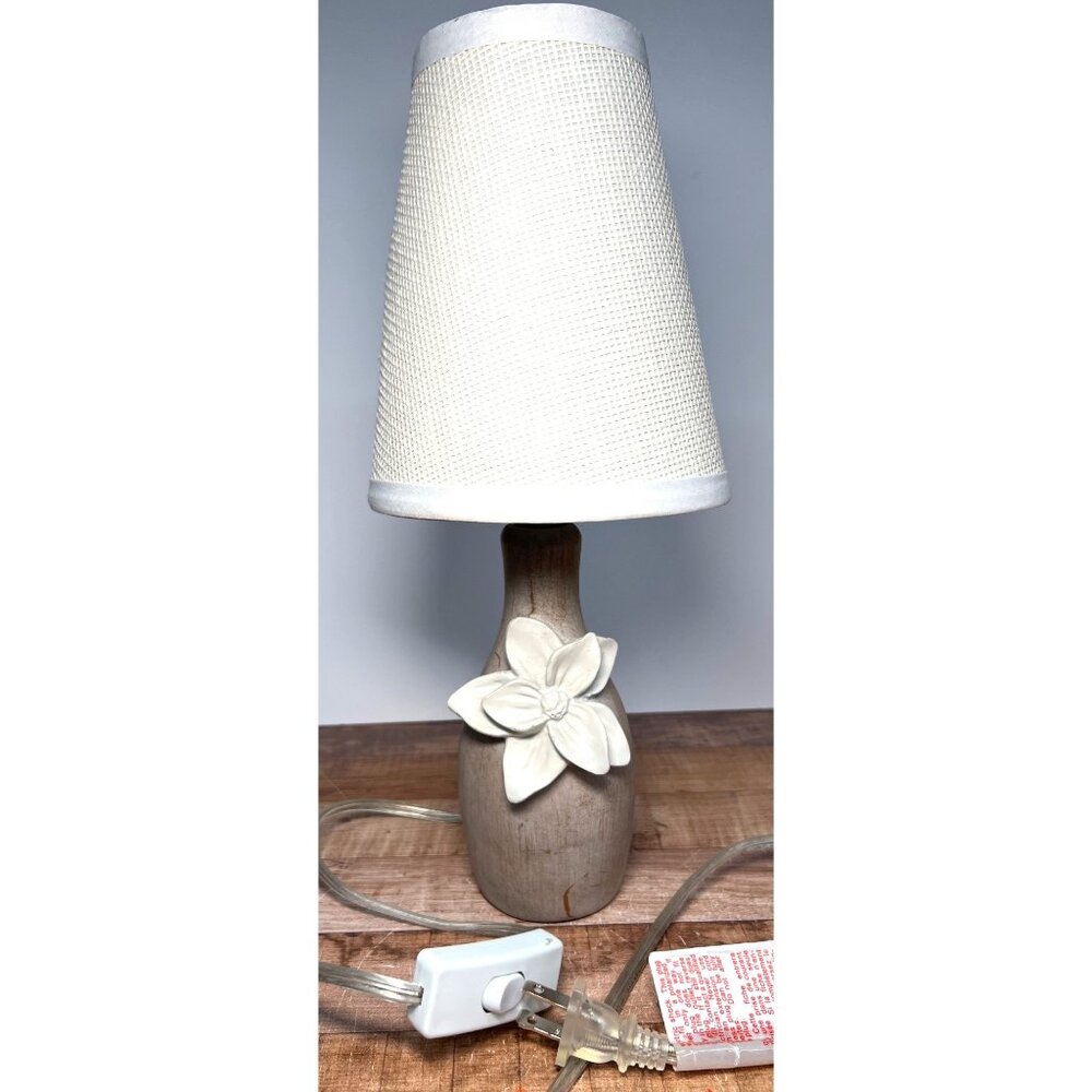 Handcrafted Beige Ceramic Table Lamp With White Flower Accent & Woven Fabric Sha